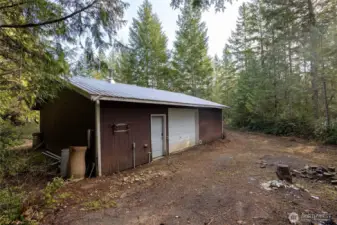 Wood Framed shop- Garage doors on both sides.