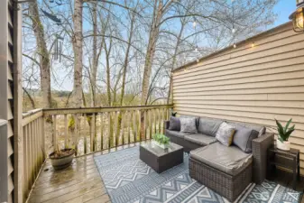 Balcony off the kitchen/living room is wonderful in the spring/summer with greenery surrounding it!