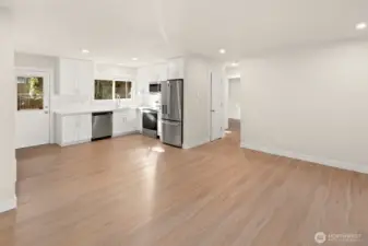 Unit B - living room flowing into the kitchen