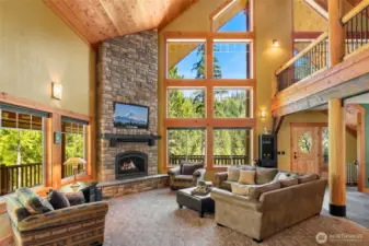 The second home features vaulted ceilings, fireplace and loft area.