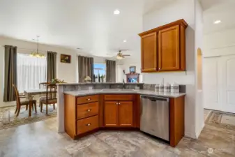 Having a sink at the countertop bar is handy, and the vinyl floors are maintained meticulously!