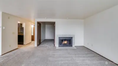 Open floorplan seamlessly flows into the dining area and kitchen.