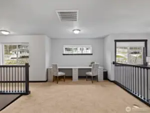 A versatile upstairs landing offering endless possibilities—create a cozy reading nook, a play area, or a secondary lounge space.