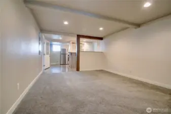 Lower level living room open to kitchen
