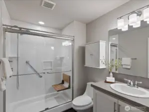 Three-quarter bath on lower level with accessible shower.