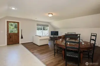 Spacious Living/Dining space in Apartment above Garage/Shop. The Kitchen is to your back.
