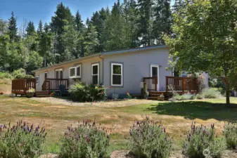 Backside of the house showing both decks.
