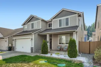 Welcoming covered front porch, perfect for enjoying the outdoors.