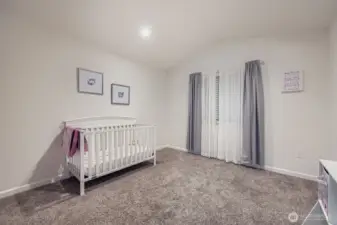 Bedroom with alcove and walk-in closet.