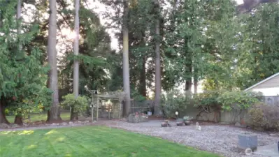 1st back yard area and 2nd patio. Fire pit in need of your personal touches.