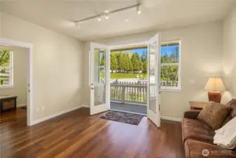 The lower level is flexible for use as a bonus room, den/office, or gym.