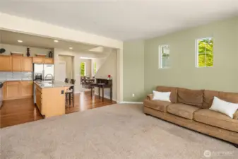The living room is open to the kitchen for easy flow gatherings.