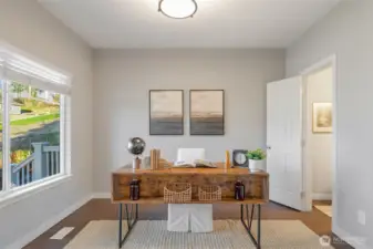 Main floor office or library room, with closet (Yes, could be a bedroom if you add a door). Door to the right is the main floor guest bath.