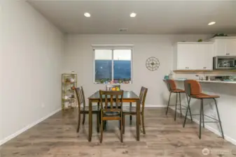 Dining room and eating bar off the kitchen.