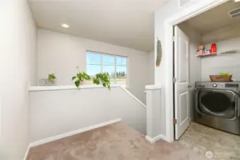 Upper floor landing and laundry room.