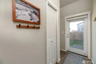 Door to the fully fenced backyard.