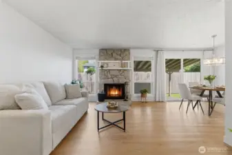 Walk into your light and bright family room with wood burning fireplace