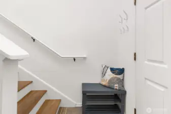 Entry hall and stairs up to the bedrooms.
