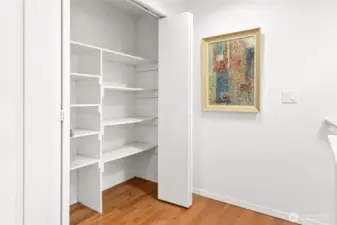 Landing on the upper level. Great closet for linens and storage.