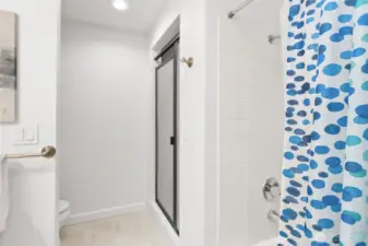 5 piece bathroom. Bathtub and shower. Double sinks.