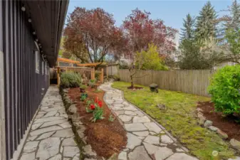 You will love the rock path that sparkles and landscaping.