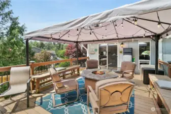 Enjoy the beauty of the deck, perfect for outdoor gatherings and soaking up the sunshine in style.