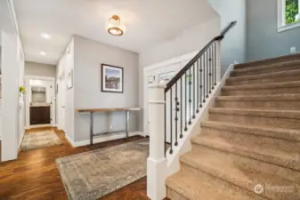 Hallway to the guest room, bath and den/ office/ downstairs