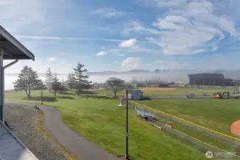 Windjammer park baseball fields showing path that goes through the park in the distance there.. park area by the trees for the family and kids