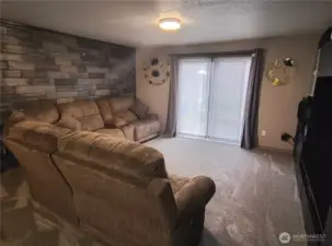 living room with wood wall