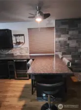 Kitchen bar counter eating space with bar wine/beverage fridge