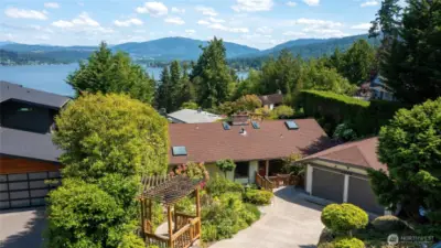 Home is nestled in the hillside over Lake Sammamish