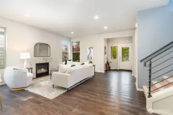 Cozy gas fireplace and open concept living