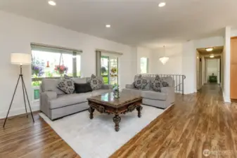 Living Area with Sliding Glass Door to Front Porch