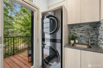 The laundry area was also re-designed adding a one-piece LG Smart Tower stacking W/D and incorporating a new handy sink too.