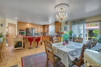 Casual dining space seamlessly connected to the kitchen and family room.