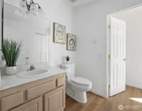 Main Floor guest bathroom on the main level includes a separate shower attached to the second bedroom.