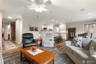 Slide down by the fireplace and look at the open style of the main living areas.