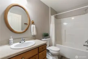 The main bath is next and has a full tub and shower. Convenient to the second bedroom and the living areas.