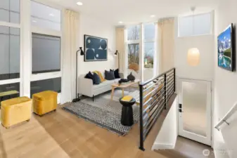 Tall ceilings and over-sized windows flood the living spaces with warm, natural light throughout the day.