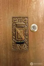 Vintage carved door entry to your new home.