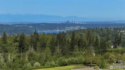 Enjoy the views of mountain, Lake Sammamish, Seattle and Bellevue cityscape views.