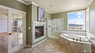 .  Relax with a see-through fireplace, huge walk-in closet and a spa inspired 5-piece ensuite.