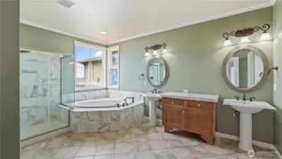 Unwind in the large soaking tub while taking in serene, picture-perfect views.