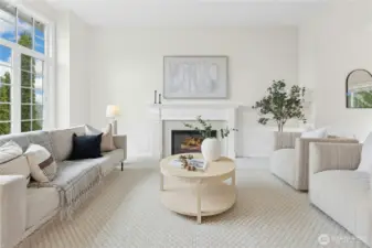 From this Living Room, enjoy views towards Mt Rainier to the southeast, 10' ceilings and a gas fireplace.