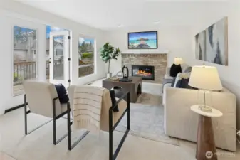 A spacious family room with French Doors out to the deck and rear yard.