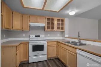 Lots of counter space for prep work and a tiered counter, perfect for entertaining in the family room