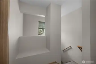 2nd floor landing has this cute little bench, perfect for a little reading nook