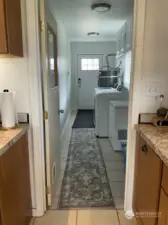 Laundry room off of kitchen.