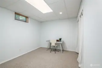 Bonus room in basement could be an office or den.