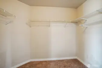 Roomy walk-in closet in primary suite